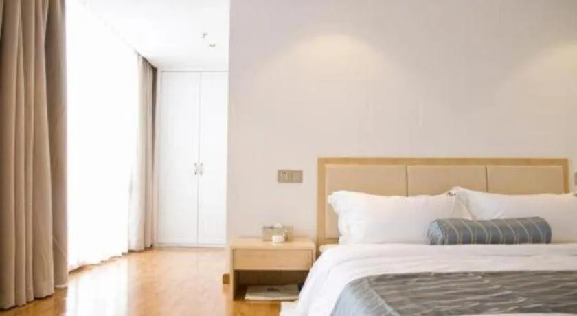 Bed in Guangzhou Impression Hotel