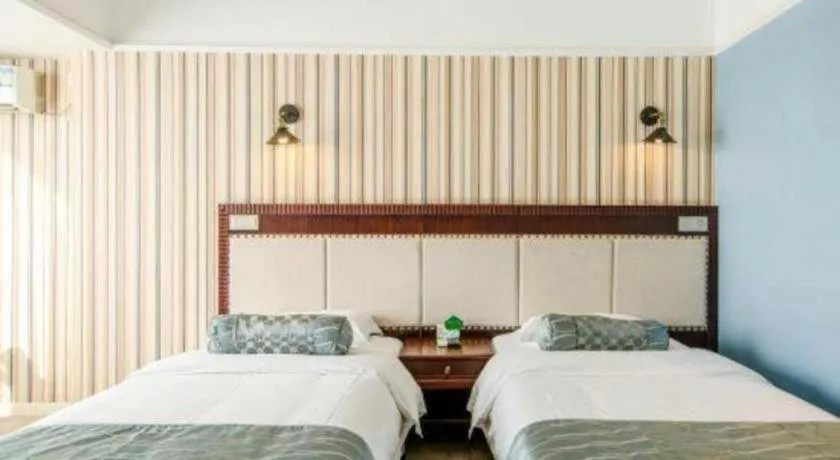 Bed in Guangzhou Impression Hotel