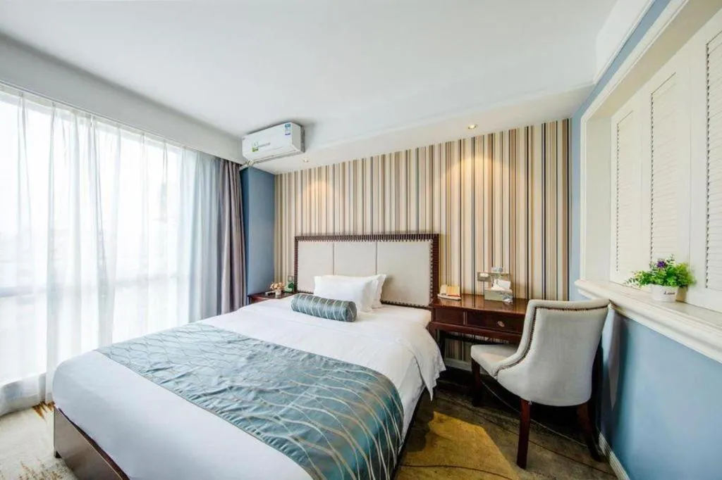 Bed in Guangzhou Impression Hotel