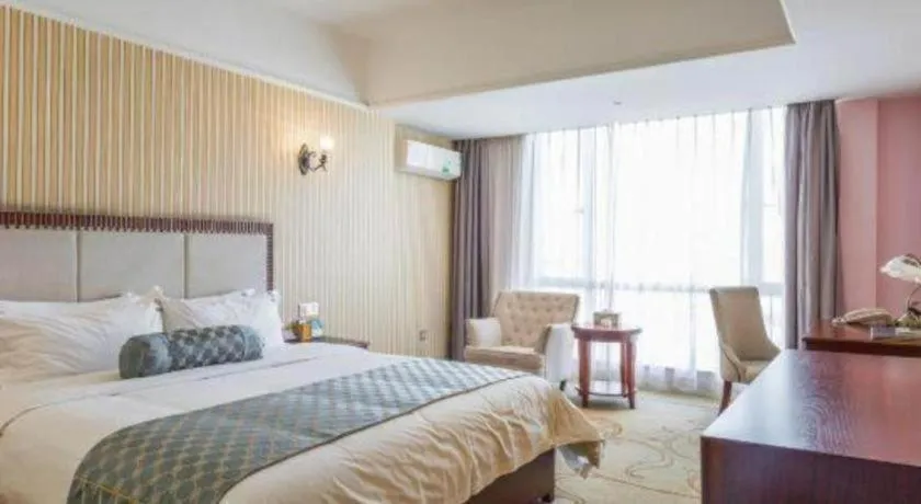 Bed in Guangzhou Impression Hotel