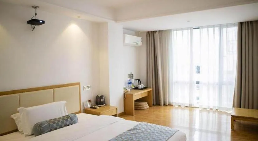 Bed in Guangzhou Impression Hotel