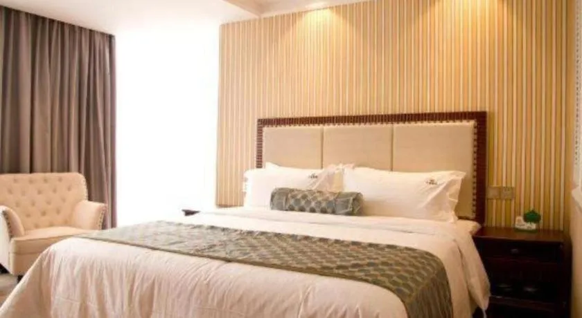 Bed in Guangzhou Impression Hotel