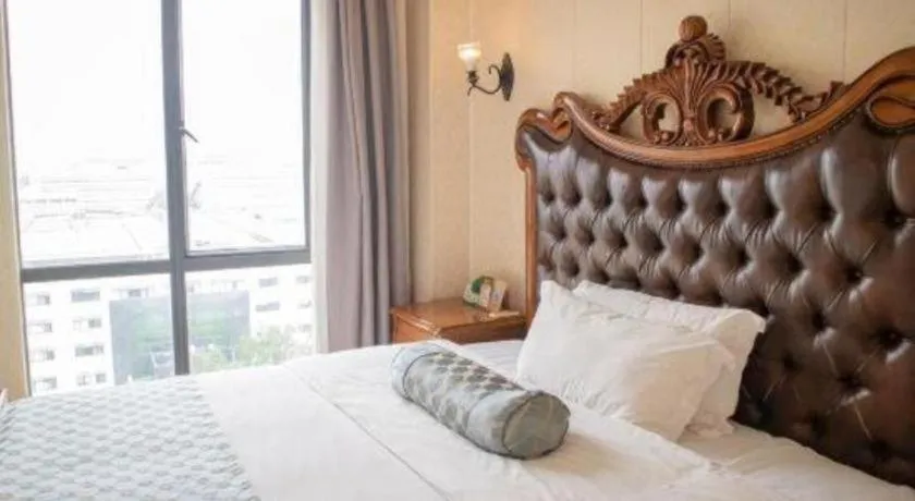 Bed in Guangzhou Impression Hotel