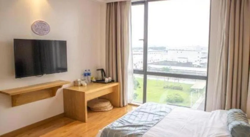 Bed in Guangzhou Impression Hotel