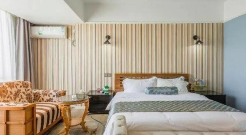 Bed in Guangzhou Impression Hotel