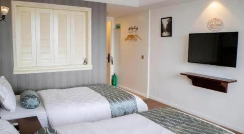 Bed in Guangzhou Impression Hotel