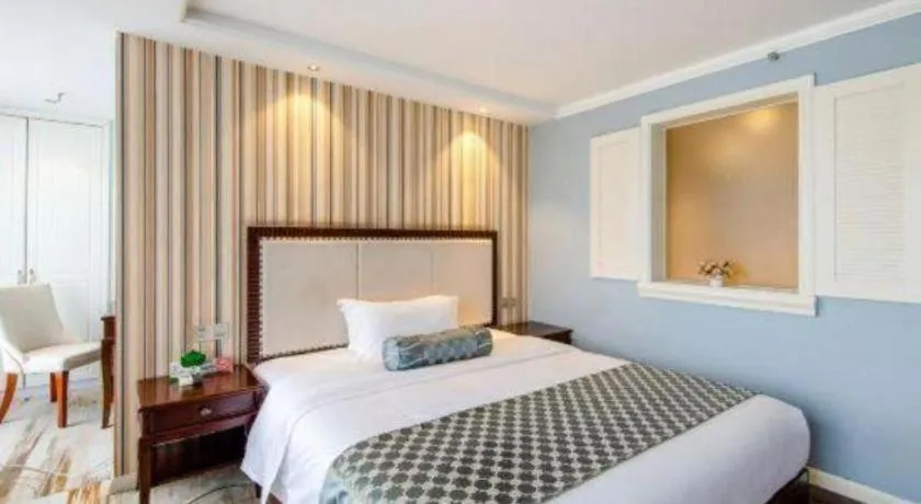 Bed in Guangzhou Impression Hotel