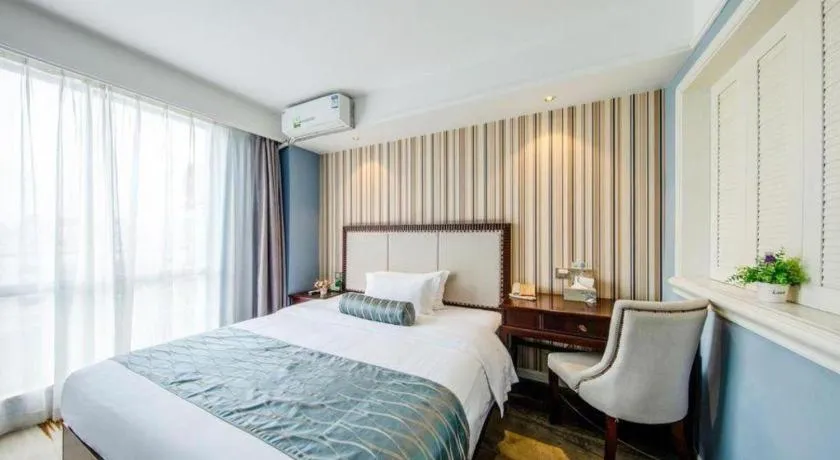 Bed in Guangzhou Impression Hotel