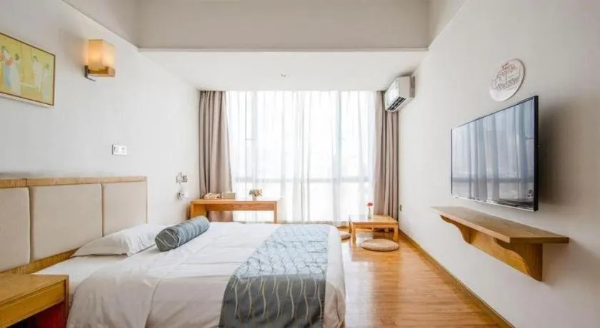 Bed in Guangzhou Impression Hotel