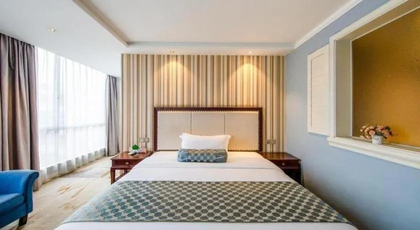 Bed in Guangzhou Impression Hotel