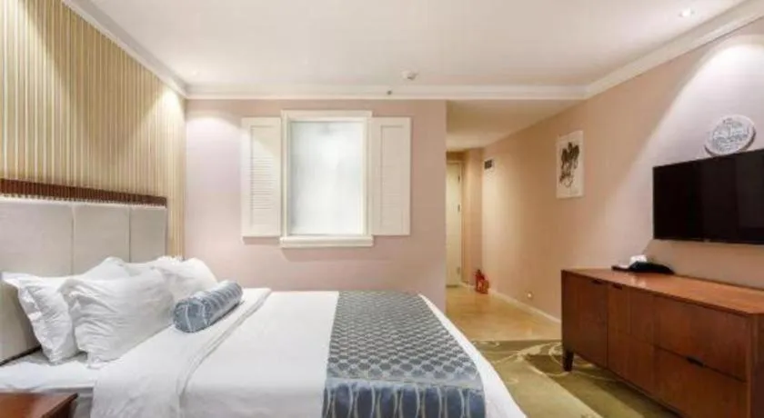 Bed in Guangzhou Impression Hotel