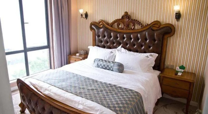 Bed in Guangzhou Impression Hotel