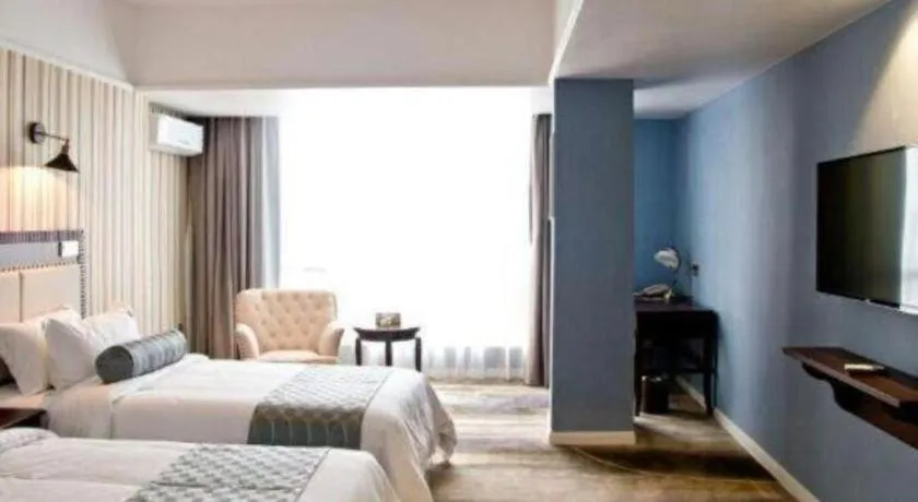 Bed in Guangzhou Impression Hotel