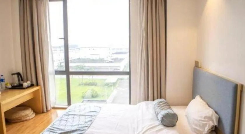 Bed in Guangzhou Impression Hotel