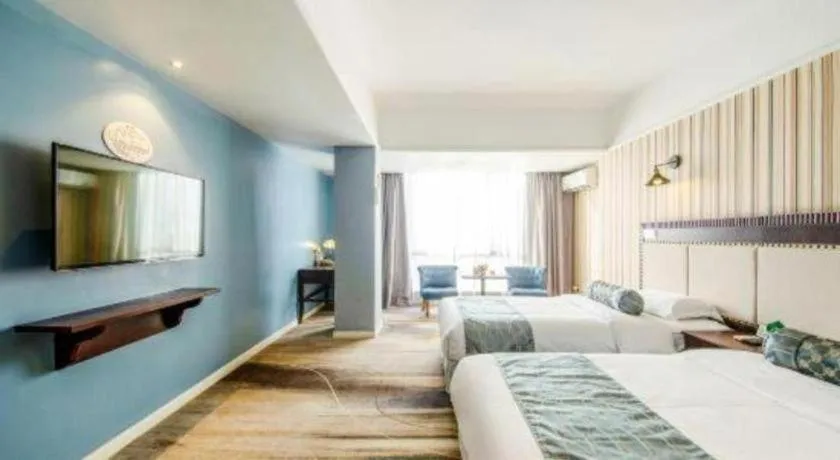 Bed in Guangzhou Impression Hotel