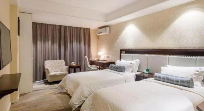 Bed in Guangzhou Impression Hotel