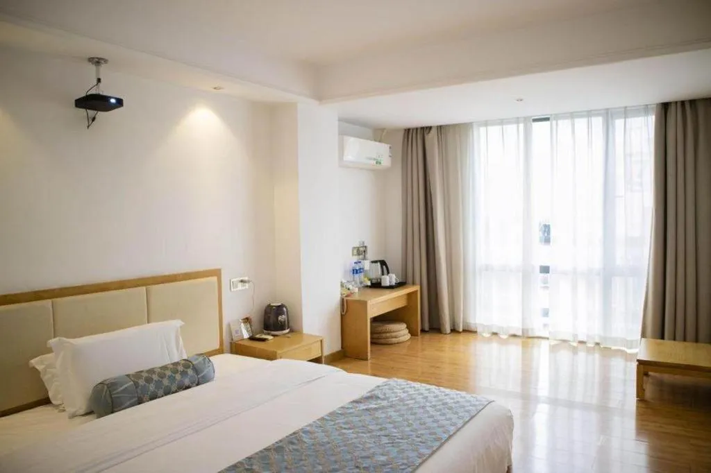 Bed in Guangzhou Impression Hotel