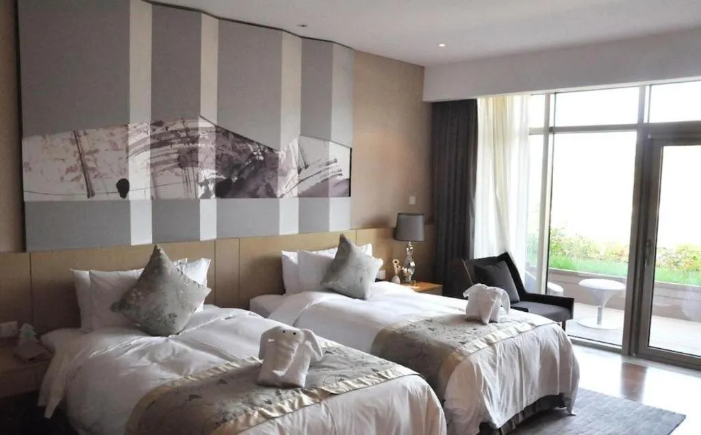 Bed in CITIC Jinling Hotel