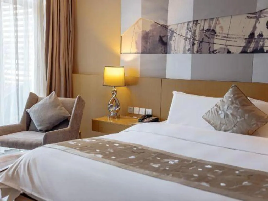 Bed in CITIC Jinling Hotel