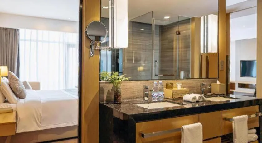 Bed in CITIC Jinling Hotel