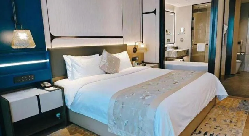 Bed in CITIC Jinling Hotel