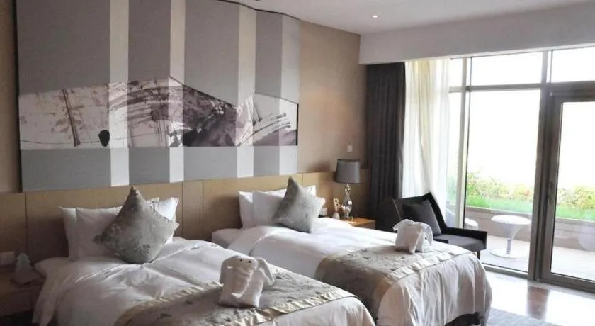 Bed in CITIC Jinling Hotel