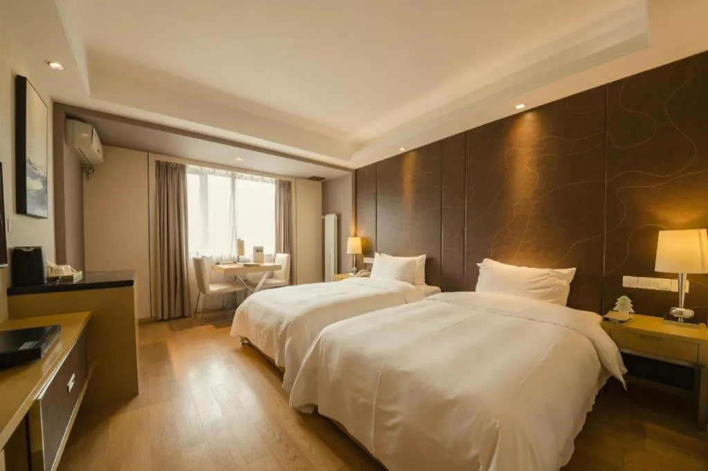 Bed in CITIC Jinling Hotel