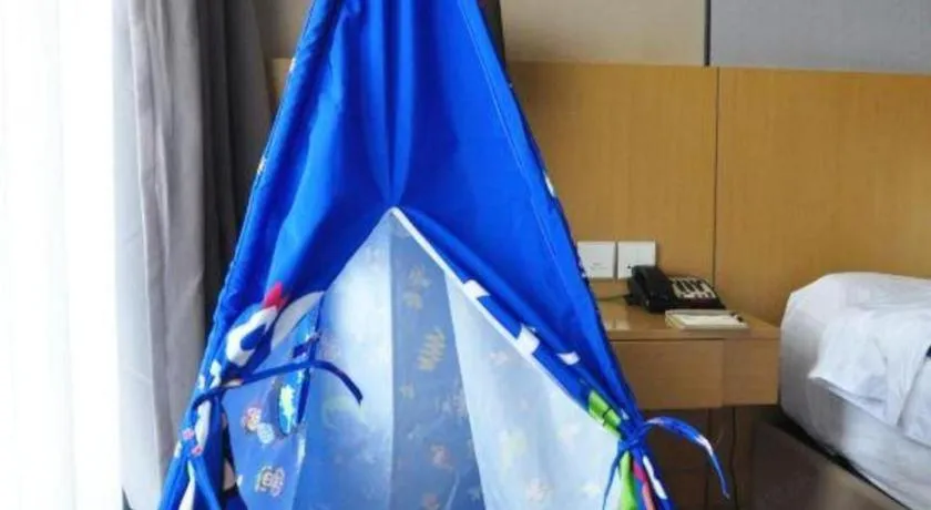 Bed in CITIC Jinling Hotel