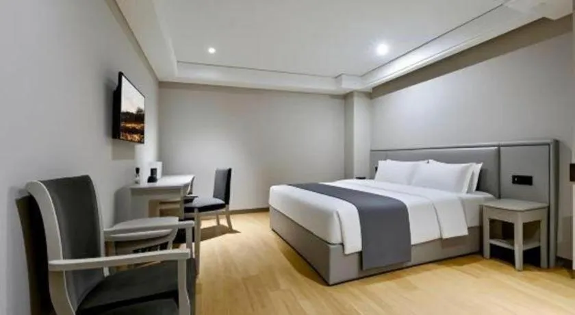 Bed in GreenTree Inn Fuyang Yijing International North Business