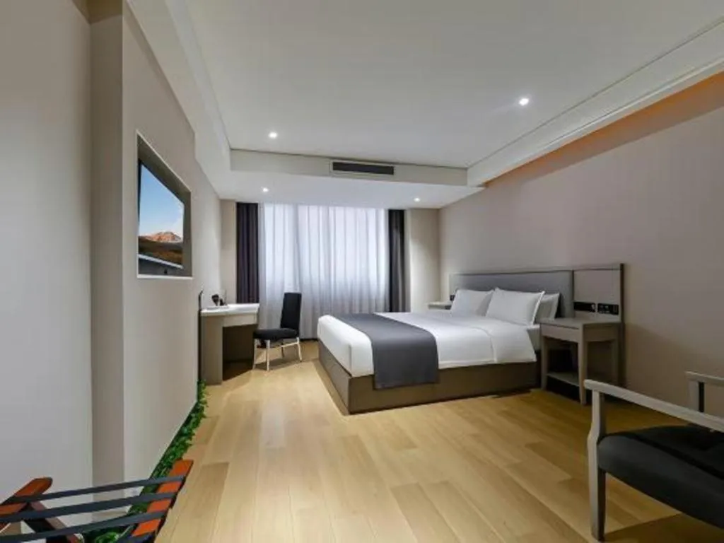 Bed in GreenTree Inn Fuyang Yijing International North Business