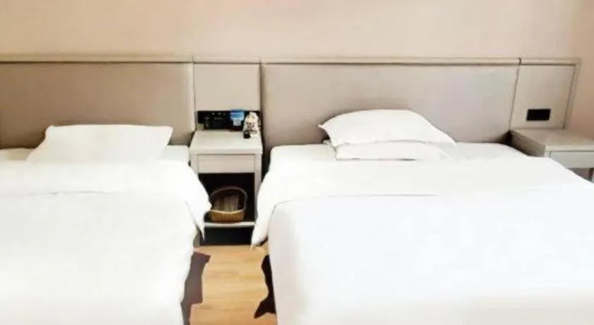 Bed in GreenTree Inn Fuyang Yijing International North Business