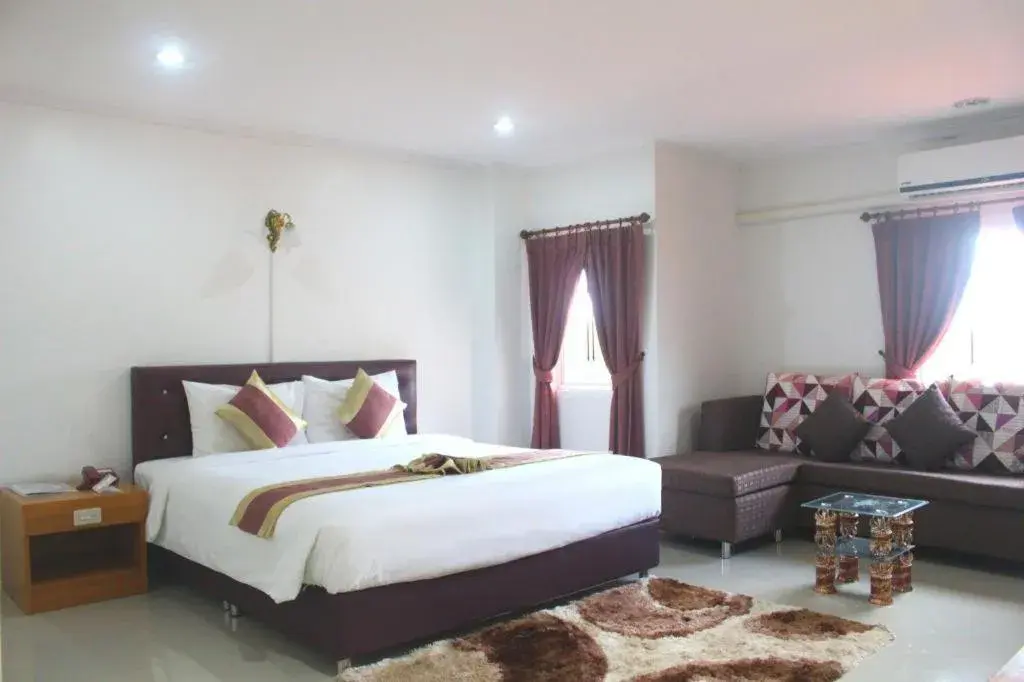 Bed in VC Phayao Hotel Bed in VC Phayao Hotel