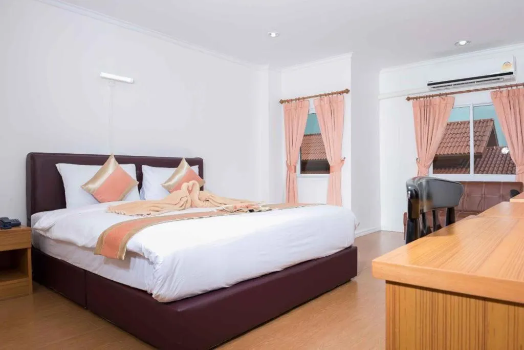 Bed in VC Phayao Hotel