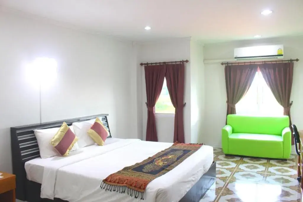 Bed in VC Phayao Hotel Bed in VC Phayao Hotel