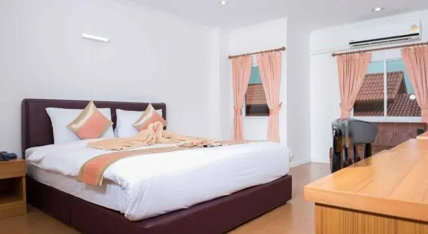 Bed in VC Phayao Hotel Bed in VC Phayao Hotel