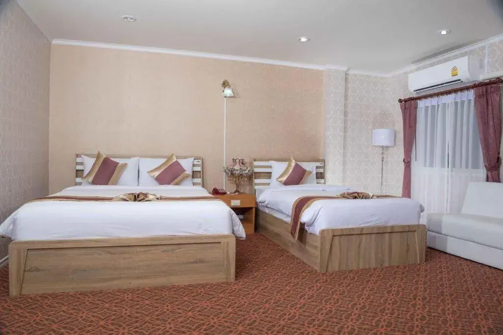 Bed in VC Phayao Hotel Bed in VC Phayao Hotel