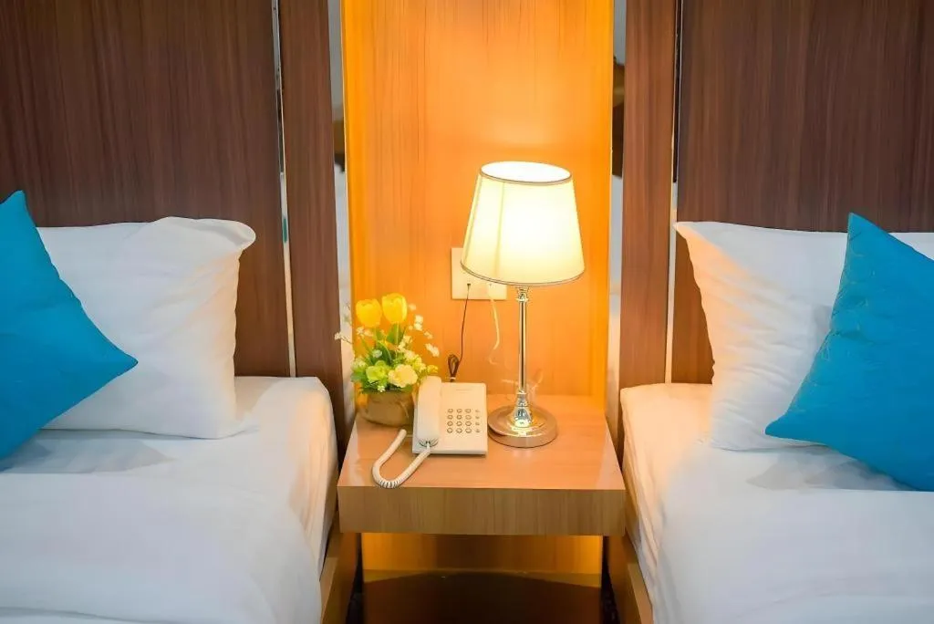 Bed in Thanburi Hotel