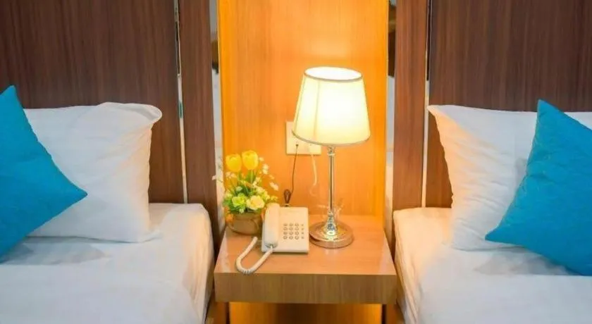 Bed in Thanburi Hotel