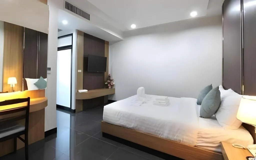 Bed in Thanburi Hotel