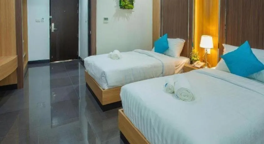 Bed in Thanburi Hotel