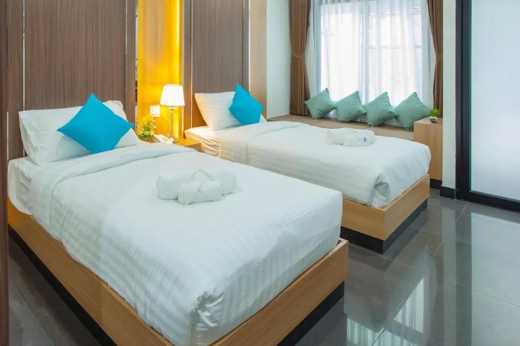 Bed in Thanburi Hotel