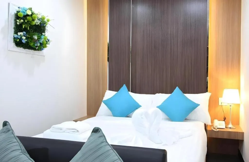 Bed in Thanburi Hotel