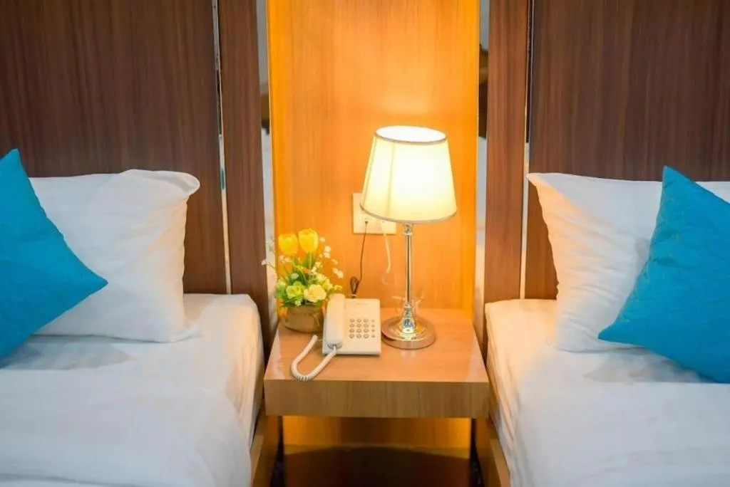 Bed in Thanburi Hotel