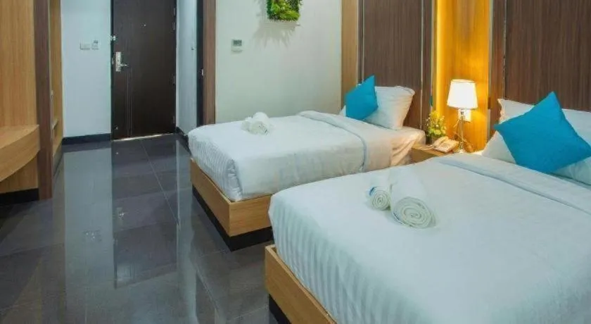 Bed in Thanburi Hotel