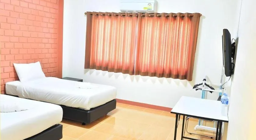 Bed in Bussarakam Place Hotel