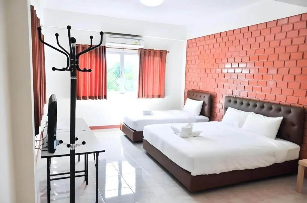 Bed in Bussarakam Place Hotel