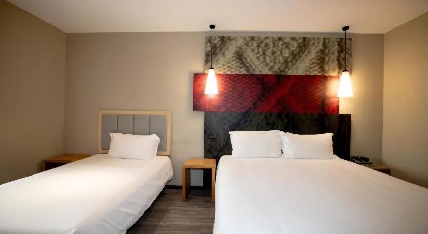 Bed in ibis Wuxi Jiangnan University