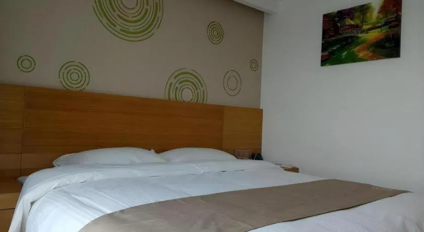 Bed in GreenTree Inn Anqing Qianshan County Sunshine City Express Hotel