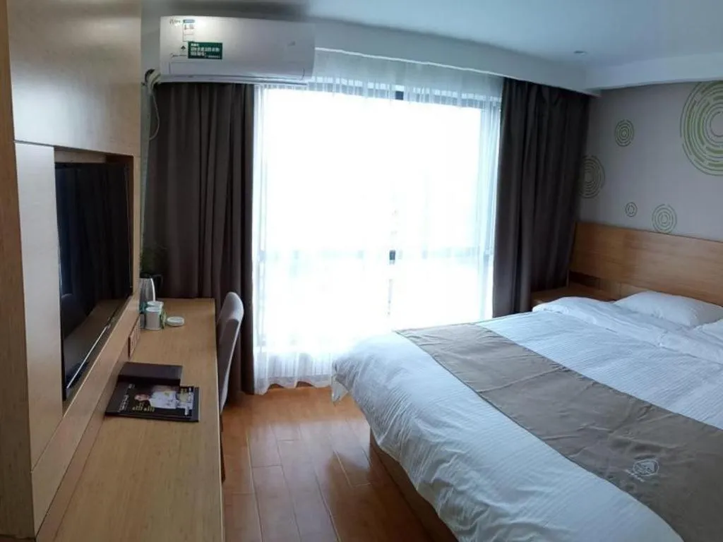Bed in GreenTree Inn Anqing Qianshan County Sunshine City Express Hotel