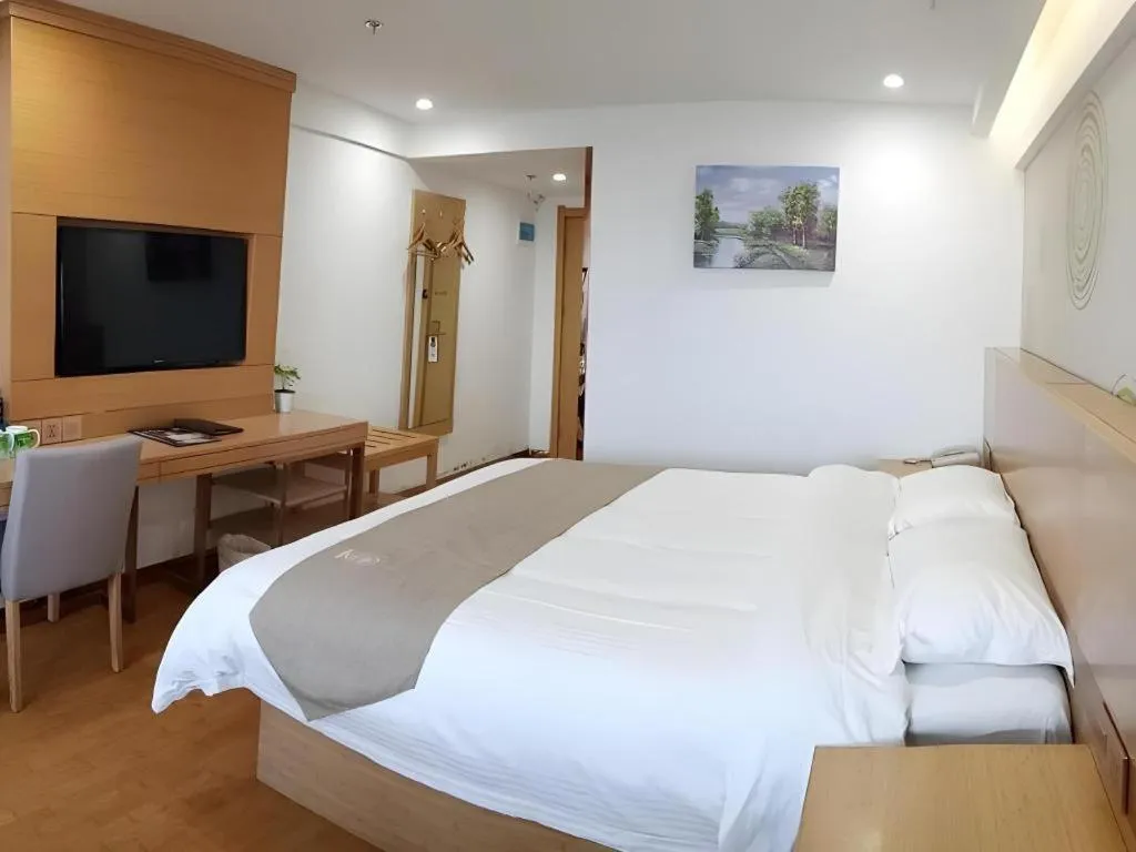 Bed in GreenTree Inn Anqing Qianshan County Sunshine City Express Hotel
